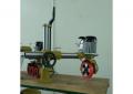 20-32-553 Padavimo – prispaudimo mechanizmas WOODLAND MACHINERY  (naujas)