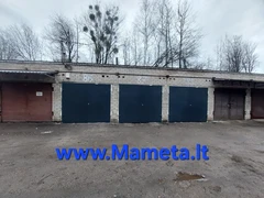 Metaliniai, atveriami garažo vartai. 