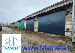 Metaliniai, atveriami garažo vartai. 